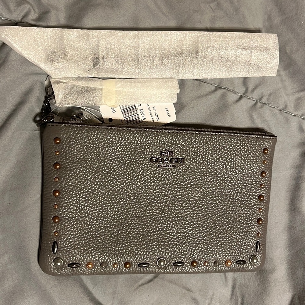 Coach embellished wristlet
